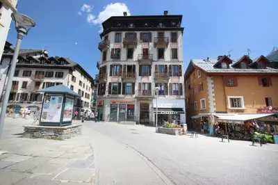 a street in a town with buildings and a street light at Nook 40 - Les Balances - Central Mont-Blanc views in Chamonix-Mont-Blanc