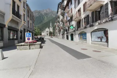 an empty street in a town with buildings at Nook 40 - Les Balances - Central Mont-Blanc views in Chamonix-Mont-Blanc