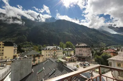 a view of a city with a mountain in the background at Nook 40 - Les Balances - Central Mont-Blanc views in Chamonix-Mont-Blanc