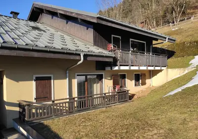 a deck with a view of the mountains at Apartment Joly-Vue in Saint-Gervais-les-Bains