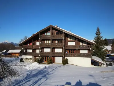 a large building with snow in front of it at Appartement Mansardé 3 Pièces, 6 Pers, Balcon Sud-Est, Garage, Proche Centre et Pistes - FR-1-572-147 in Arâches-la-Frasse