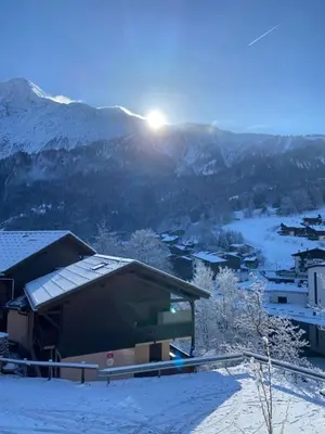a balcony with a view of a snow covered mountain at Vue Des 