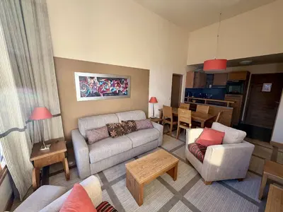 a living room with a couch and a table at Appartement 3 pièces à Flaine, Résidence de Luxe avec Piscine, Spa et Salle de Sport, Pied des Pistes - FR-1-687-6 in Flaine