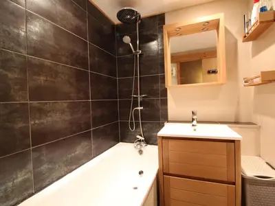 a bathroom with a shower and a tub and a sink at Studio rénové 4 pers, Résidence Andromède, Flaine Forêt, à 300m des pistes et 140m des commerces - FR-1-687-26 in Arâches-la-Frasse