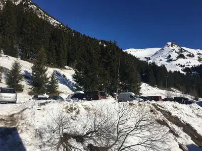 a group of cars parked on a snow covered mountain at Appartement 3 pièces pour 6 personnes à 350m des pistes – Résidence Petite Ourse, Flaine Forêt - FR-1-687-16 in Arâches-la-Frasse