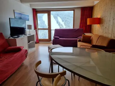 a living room with a couch and a table at Appartement Rénové - 2 Pièces, 6 Pers, Pied des Pistes - Résidence Cassiopée, Flaine Forum - FR-1-687-32 in Arâches-la-Frasse