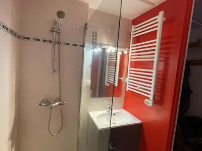 a bathroom with a shower with a sink and a glass shower door at Appartement Rénové - 2 Pièces, 6 Pers, Pied des Pistes - Résidence Cassiopée, Flaine Forum - FR-1-687-32 in Arâches-la-Frasse