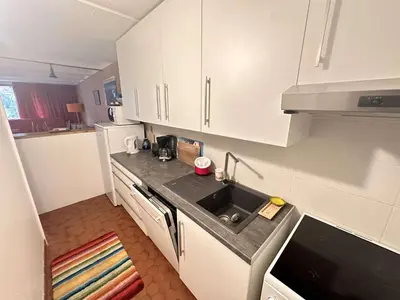 a kitchen with a sink and a counter top at Appartement Rénové - 2 Pièces, 6 Pers, Pied des Pistes - Résidence Cassiopée, Flaine Forum - FR-1-687-32 in Arâches-la-Frasse