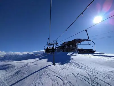 a ski lift on a snow covered ski slope at Appartement 3 pièces pour 8 personnes aux pieds des pistes à Flaine - FR-1-687-44 in Arâches-la-Frasse