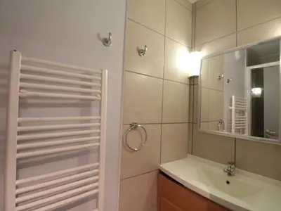 a bathroom with a shower and a sink and a mirror at Appartement 3 pièces pour 8 personnes aux pieds des pistes à Flaine - FR-1-687-44 in Arâches-la-Frasse