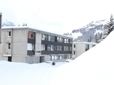 a building with snow in front of it at Studio pour 4 personnes, résidence Bellatrix, Flaine Front de Neige, accès direct aux pistes - FR-1-687-45 in Arâches-la-Frasse