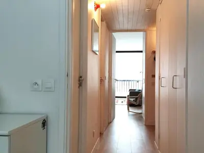 a hallway with a hallway leading to a room at Appartement 2 Pièces avec Balcon, Proche Pistes - FR-1-687-56 in Arâches-la-Frasse