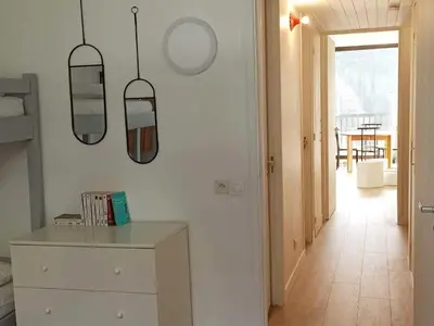 a room with a dresser and two mirrors on the wall at Appartement 2 Pièces avec Balcon, Proche Pistes - FR-1-687-56 in Arâches-la-Frasse