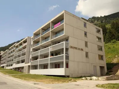 a large apartment building on the side of a hill at Appartement 2 pièces pour 5 pers. à Flaine Forêt, à 350m des pistes et proche des commerces - FR-1-687-34 in Arâches-la-Frasse