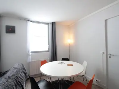 a small room with a white table and chairs at Appartement 2 pièces pour 5 pers. à Flaine Forêt, à 350m des pistes et proche des commerces - FR-1-687-34 in Arâches-la-Frasse