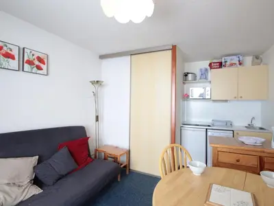a living room with a couch and a table at Studio Cabine 5 pers avec Balcon - Résidence Sagittaire, Flaine Forêt - FR-1-687-43 in Arâches-la-Frasse