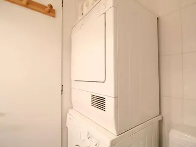 a microwave sitting on top of a cabinet in a bathroom at Studio 4 pers, proche pistes, animaux bienvenus - FR-1-687-37 in Arâches-la-Frasse