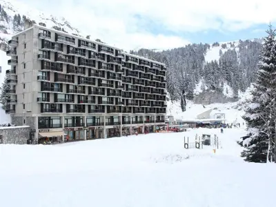 a large building in the snow in front of a mountain at Appartement 3 pièces pour 8 pers, au pied des pistes – Résidence Aldebaran, Flaine Forum - FR-1-687-57 in Arâches-la-Frasse
