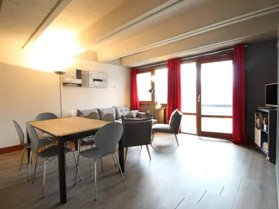 a dining room with a table and chairs at 3 Pièces Rénové pour 6 Pers. à Flaine Forum - 50m², Proche Pistes et Commerces - FR-1-687-35 in Arâches-la-Frasse