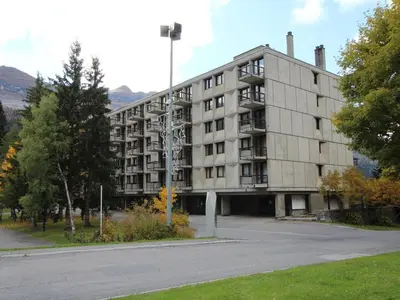 a largeartment building with a street in front of it at 3 Pièces Rénové pour 6 Pers. à Flaine Forum - 50m², Proche Pistes et Commerces - FR-1-687-35 in Arâches-la-Frasse