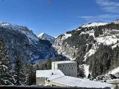 a building in the middle of a snowy mountain at 3 Pièces Rénové pour 6 Pers. à Flaine Forum - 50m², Proche Pistes et Commerces - FR-1-687-35 in Arâches-la-Frasse