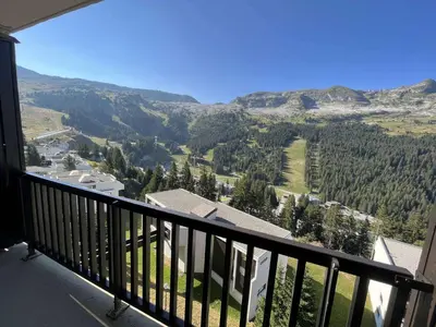 a balcony with a view of a mountain at Studio pour 4 pers., proche pistes et commerces, balcon sud, à Flaine Forêt - FR-1-687-66 in Arâches-la-Frasse