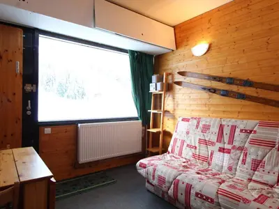 a bedroom with a bed and a large window at Studio cosy 4 pers, skis aux pieds, terrasse sud, Flaine Front de Neige - FR-1-687-73 in Arâches-la-Frasse