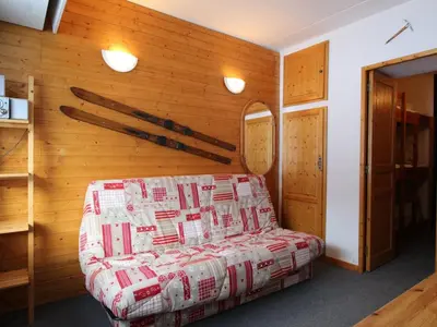 a room with a couch covered in boxes at Studio cosy 4 pers, skis aux pieds, terrasse sud, Flaine Front de Neige - FR-1-687-73 in Arâches-la-Frasse