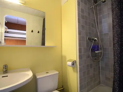 a bathroom with a toilet and a sink and a shower at Studio 4 pers. sur les pistes à Flaine, parking, casier à skis, terrasse - FR-1-687-75 in Arâches-la-Frasse