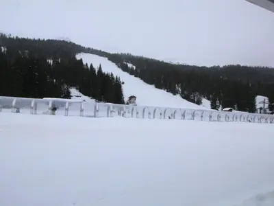 a group of people standing around a fence in the snow at Studio 4 pers. sur les pistes à Flaine, parking, casier à skis, terrasse - FR-1-687-75 in Arâches-la-Frasse
