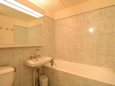 a bathroom with a sink and a tub and a toilet at Appartement spacieux 8 pers, balcon sud, Flaine Forum - FR-1-687-80 in Arâches-la-Frasse