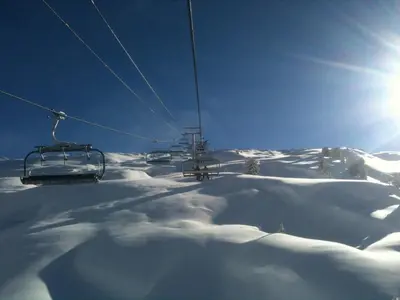 a ski lift on top of a snow covered slope at Appartement 2 Pièces 6 Pers à Flaine Forêt, Résidence Pollux, Proche Pistes et Commerces - FR-1-687-71 in Arâches-la-Frasse
