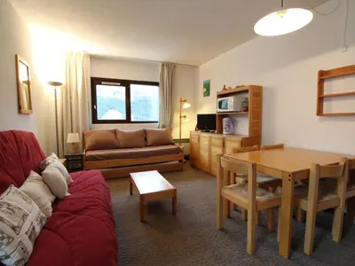a living room with a couch and a table at Appartement 2 Pièces 6 Personnes, Balcon, proche Pistes et Commerces, Flaine Forêt - FR-1-687-77 in Arâches-la-Frasse