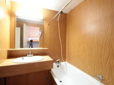 a bathroom with a sink and a mirror at Studio cosy pour 4 personnes - résidence Andromède, Flaine Forêt, proche pistes et commerces - FR-1-687-107 in Arâches-la-Frasse