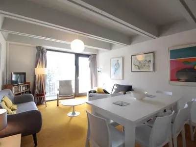 a living room with a white table and chairs at Appartement 3 pièces pour 8 pers. au pied des pistes – Résidence Aldebarran, Flaine Forum - FR-1-687-98 in Arâches-la-Frasse