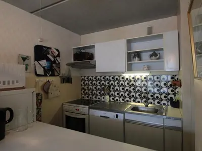 a kitchen with a sink and a counter top at Appartement 3 pièces pour 8 pers. au pied des pistes – Résidence Aldebarran, Flaine Forum - FR-1-687-98 in Arâches-la-Frasse