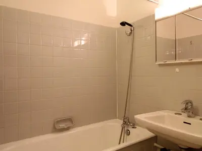 a bathroom with a sink and a bath tub and a sink at 2 pièces à Flaine, 6 couchages, à 50m des pistes - FR-1-687-89 in Arâches-la-Frasse