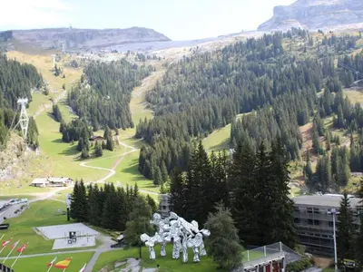 a group of statues on top of a mountain at 2 pièces à Flaine, 6 couchages, à 50m des pistes - FR-1-687-89 in Arâches-la-Frasse