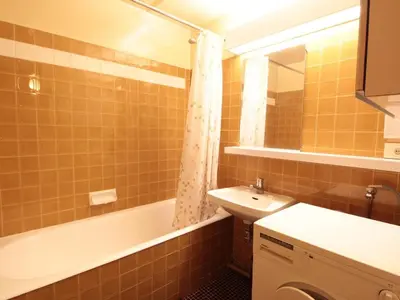 a bathroom with a sink and a toilet and a bath tub at Flaine, 3 pièces, 8 pers, près des pistes, vue domaine skiable - FR-1-687-83 in Arâches-la-Frasse