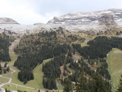 an aerial view of trees and snow covered mountains at Studio pour 4 personnes proche pistes et commerces à Flaine Forêt - FR-1-687-105 in Arâches-la-Frasse