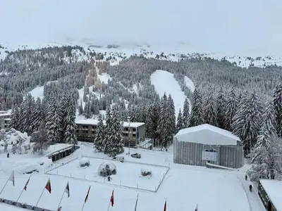 a snow covered mountain with a building and trees at Appartement 3 pièces, 8 pers, Résidence Cassiopée, Flaine Forum, à 50m des pistes et commerces - FR-1-687-87 in Arâches-la-Frasse