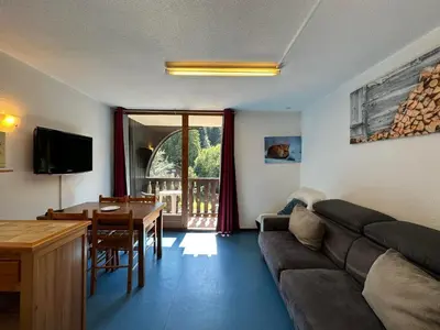 a living room with a couch and a table at Studio confortable pour 4 personnes au pied des pistes - FR-1-642-75 in Morillon