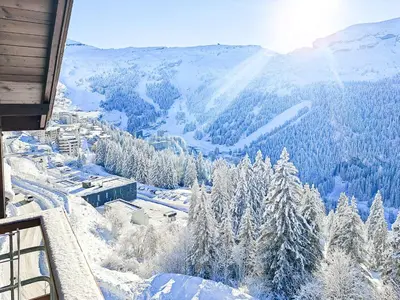 a view of a snow covered mountain with trees at South facing 2-bed apartment with fireplace, Terrasses dEos in Flaine