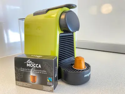 a yellow mixer next to a box on a counter at Green Apple Chamonix, centre, parking, ski-in/out in Chamonix-Mont-Blanc