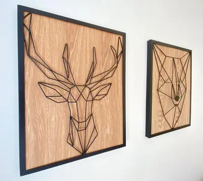 a pair of stained glass deer heads on a wall at Green Apple Chamonix, centre, parking, ski-in/out in Chamonix-Mont-Blanc