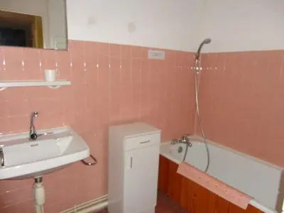 a bathroom with a sink and a bath tub at 3P 6 Pers, Cuisine rénovée, Balcon Sud, Proche Pistes et Commerces, Parking, Casier à skis - FR-1-572-204 in Arâches-la-Frasse
