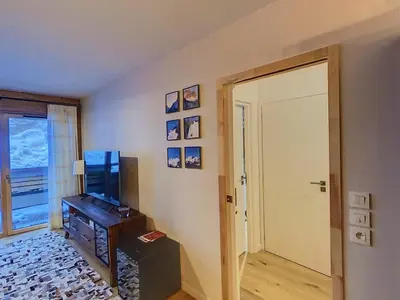a bathroom with a shower and a sink and a tub at gcf210 in Les Carroz d'Araches