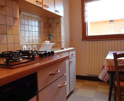 a dining room with a table and chairs at mlb22 in Les Carroz d'Araches