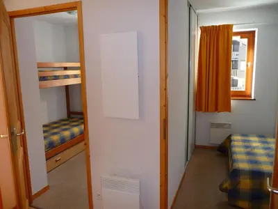 a living room with a couch and a table and chairs at 3 Pièces au pied des pistes - Morillon 1100, 6-7 pers, TV - FR-1-815-89 in Morillon