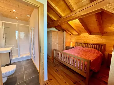 a bedroom with a bed and a bathroom at Chalet tradition 6 pers avec cheminée, balcon et parking à Samoëns - FR-1-624-124 in Samoëns